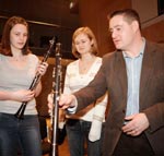 Alastair Hanson, co-founder of Hanson Clarinets, with woodwind students from the Royal Northern College of Music